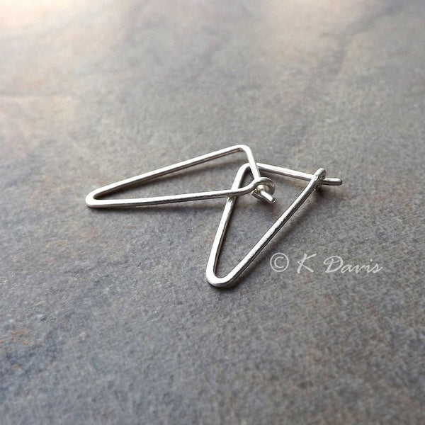 small silver triangles